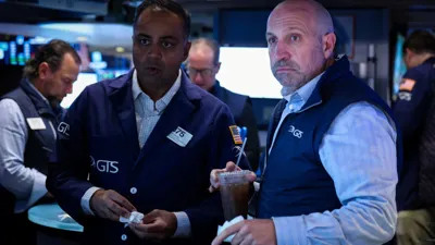 Treasury yields are lower after reaching multiyear highs, traders weigh latest bond auction