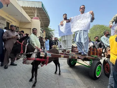 Opposition lawmakers arrive at PA on donkey carts as protest