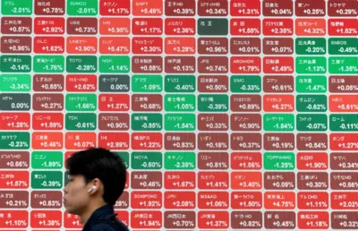 Asian markets mixed after oil gains