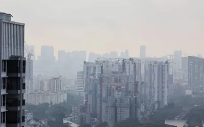 Haze in S’pore: PSI reading in central region remains unhealthy, east and west dip back to moderate