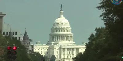 Federal Reserve hikes key rate for 1st time in 3 years, defying Trump demands for a cut